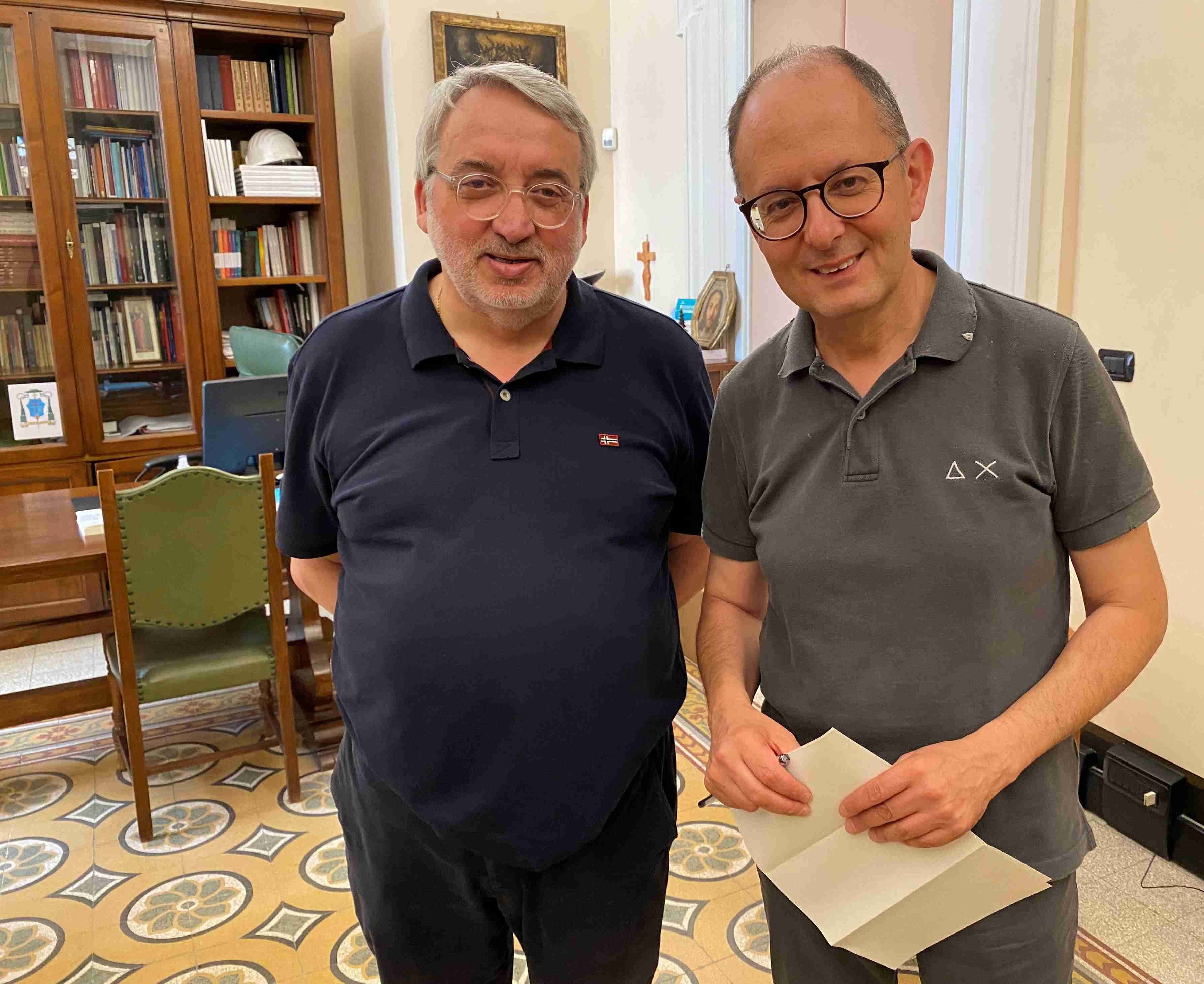 arcivescovo eletto maffeis e il vescovo amministratore diocesano salvi in curia