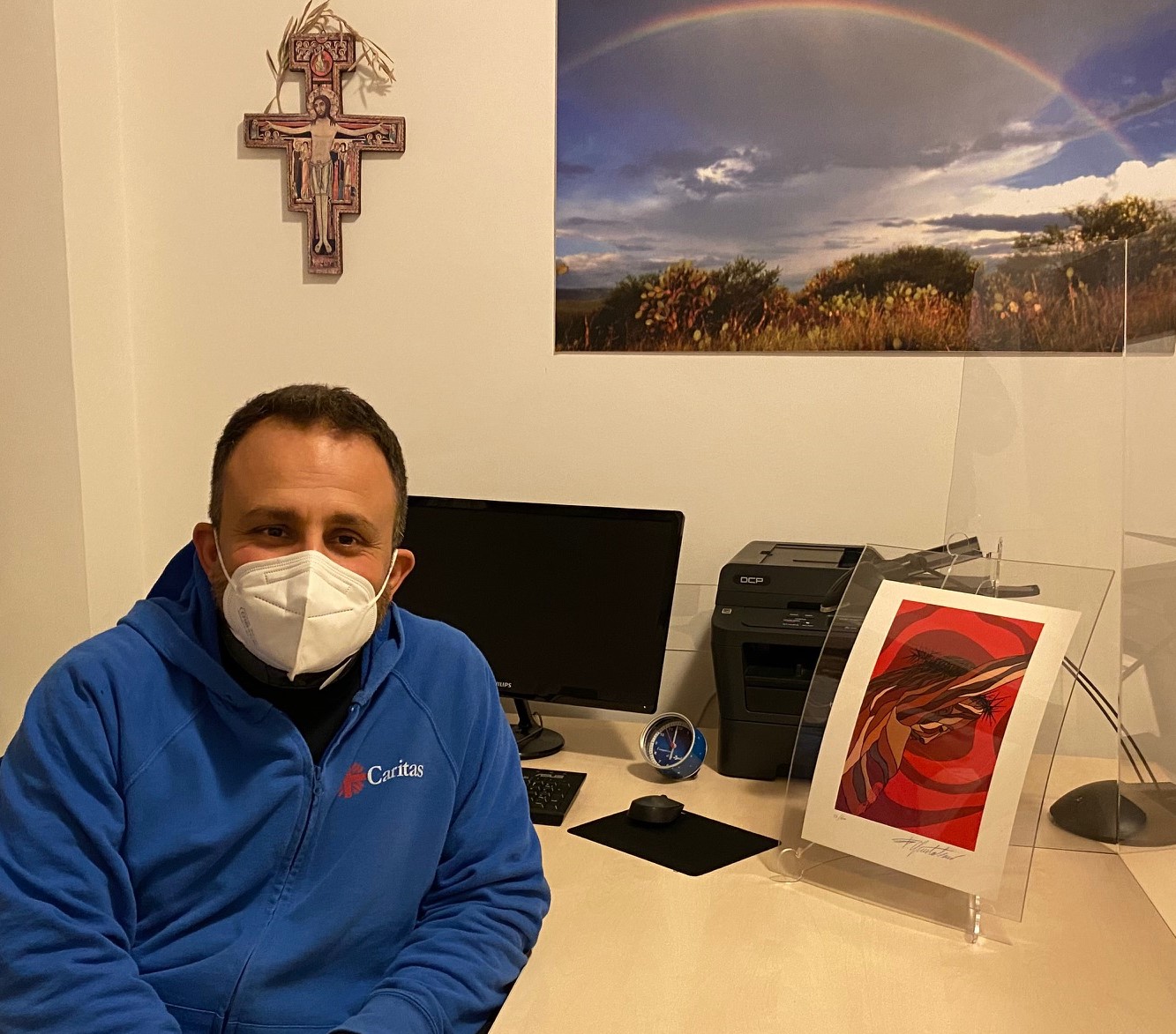 don marco briziarelli presso la caritas diocesana di perugia