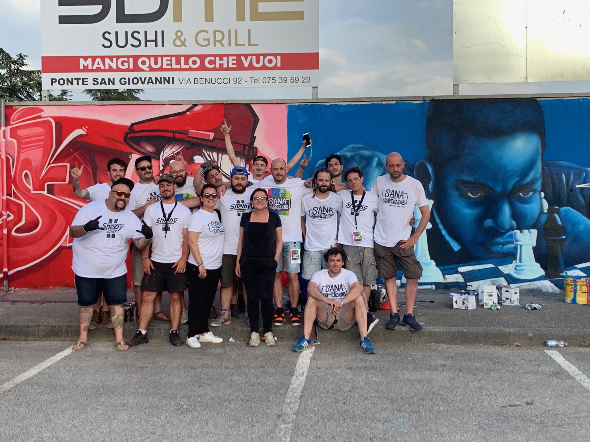 il Sindaco Paola Lungarotti e i writers squadre rosse e blu